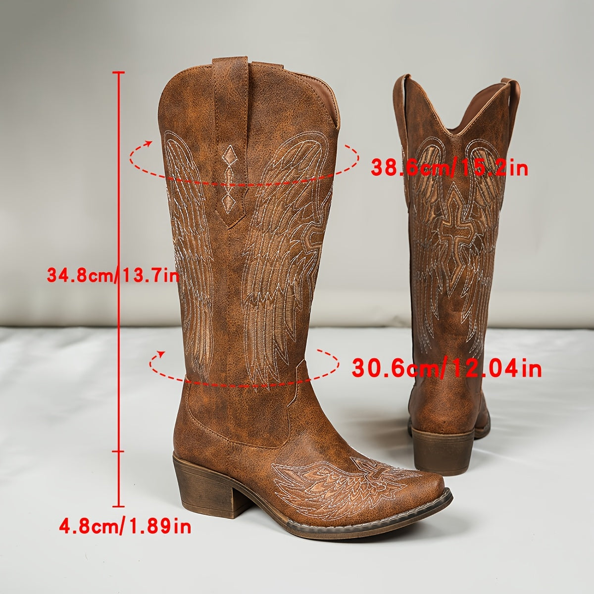Stivale texano vintage con ali a rilievo – slip‑on, tacco medio