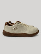 Sneakers UNA, colore beige, vista laterale: finitura con pannelli a contrasto.