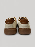 Sneakers UNA, colore beige, vista posteriore: profilo della suola e del tallone.
