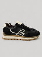 Sneakers DORA, colore nero, vista laterale: finitura con pannelli dall'effetto scamosciato.