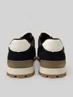 Sneakers DORA, colore nero, vista posteriore: profilo della suola e del tallone.