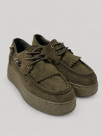 Sneakers OPAL, colore verde, vista di tre quarti: punta arrotondata e finitura effetto scamosciato.