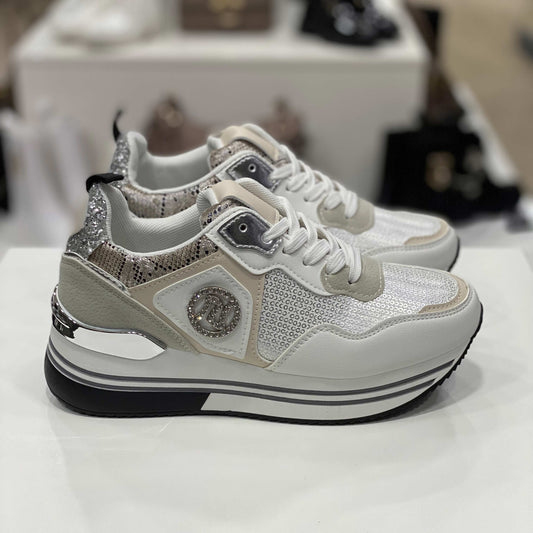 Sneakers bianche e verdi con glitter argentati e dettagli snake, vista laterale per evidenziare il design moderno